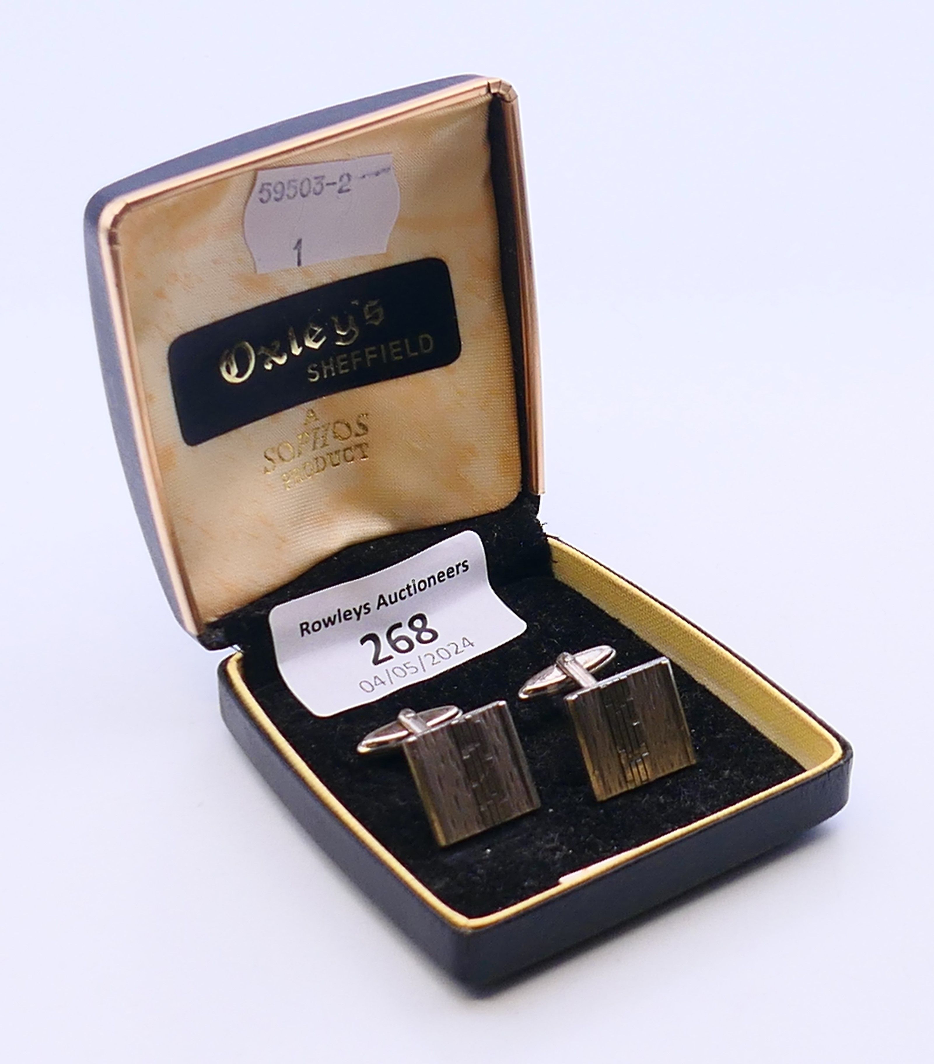 A pair of silver cufflinks, stamped 925, cased. 1.5 x 1.75 cm. - Image 4 of 4