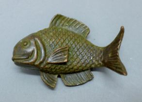 A bronze model of a fish. 5 cm long.