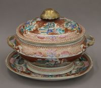 An 18th century Chinese Export porcelain tureen on stand. The stand 31 cm long.