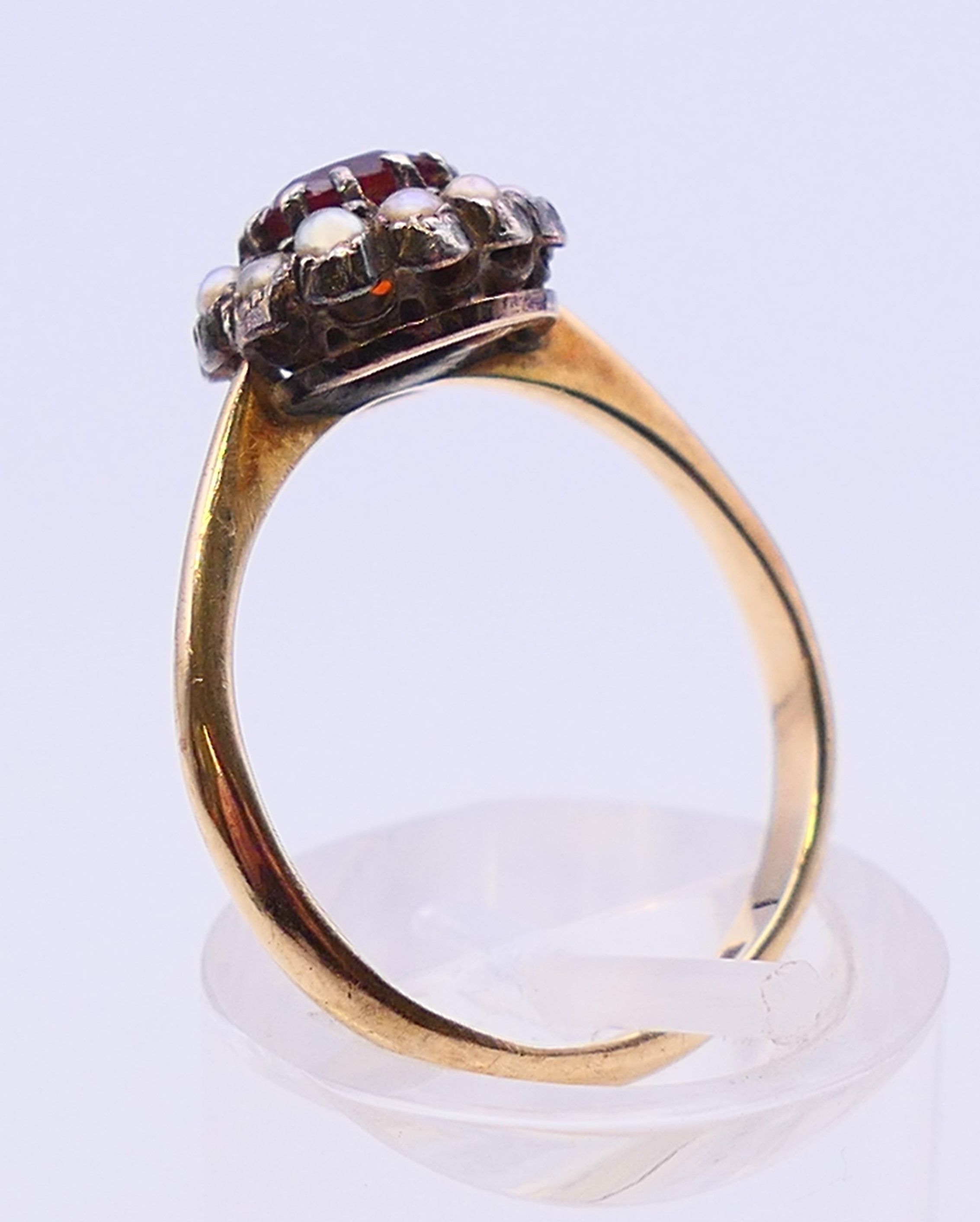 A 9 ct gold, seed pearl and garnet ring. Ring size O/P. - Image 5 of 7