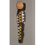 An African painted wooden tribal mask. 53 cm high.