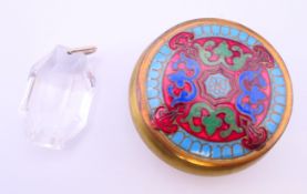 A crystal pendant drop in an enamel box. Pendant drop 4 cm high.