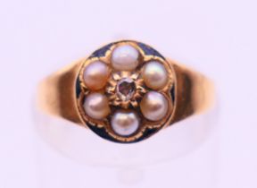 A Victorian 18 ct gold, pearl and rose diamond cluster ring, hallmarked Birmingham 1863.