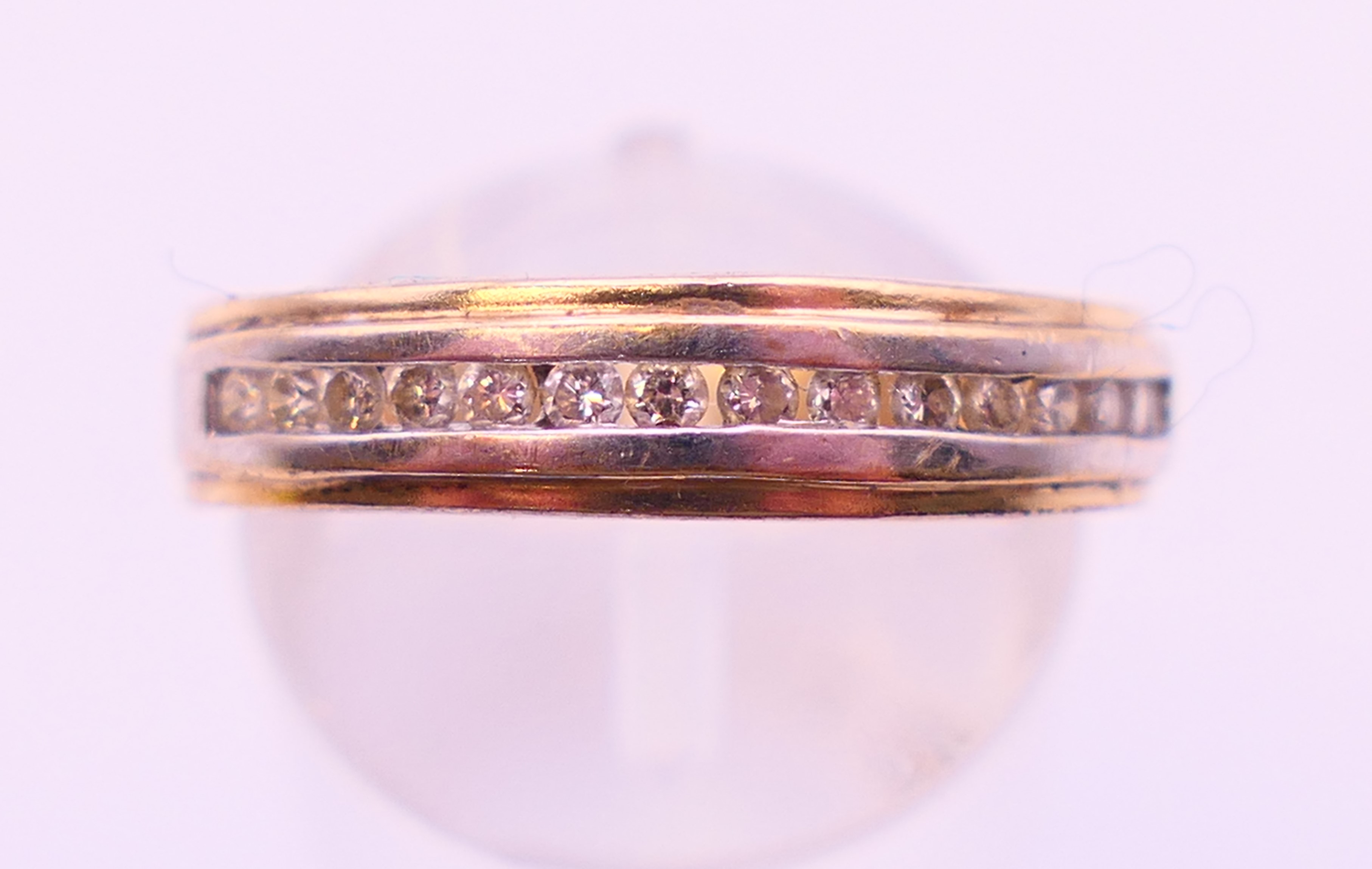 A 9 ct yellow and white gold diamond ring. Ring size P. - Image 2 of 7