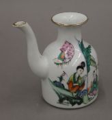A 20th century Chinese porcelain water dropper hand-painted with scholars and calligraphy.
