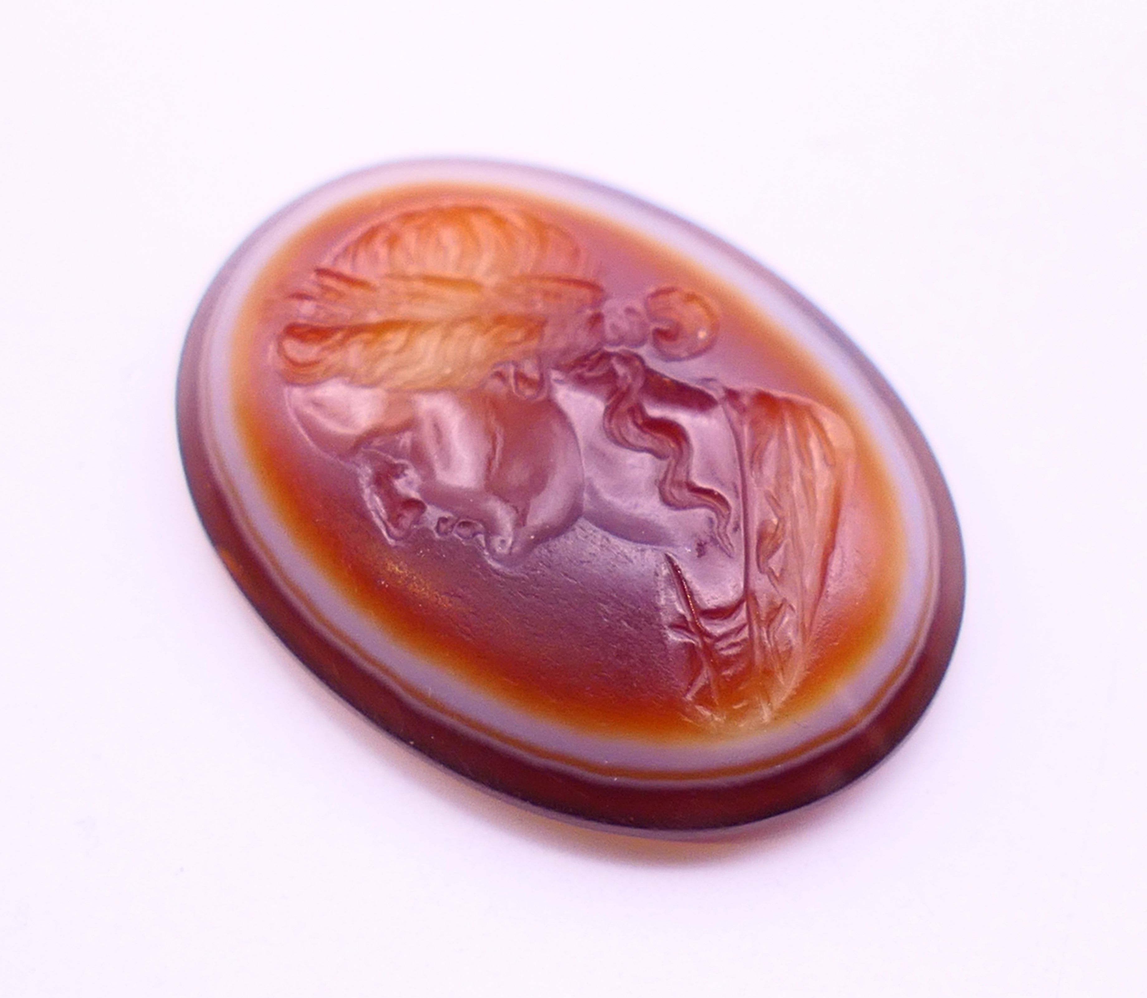 An antique banded agate intaglio carved with the profile of a Roman lady. 2. - Image 2 of 6