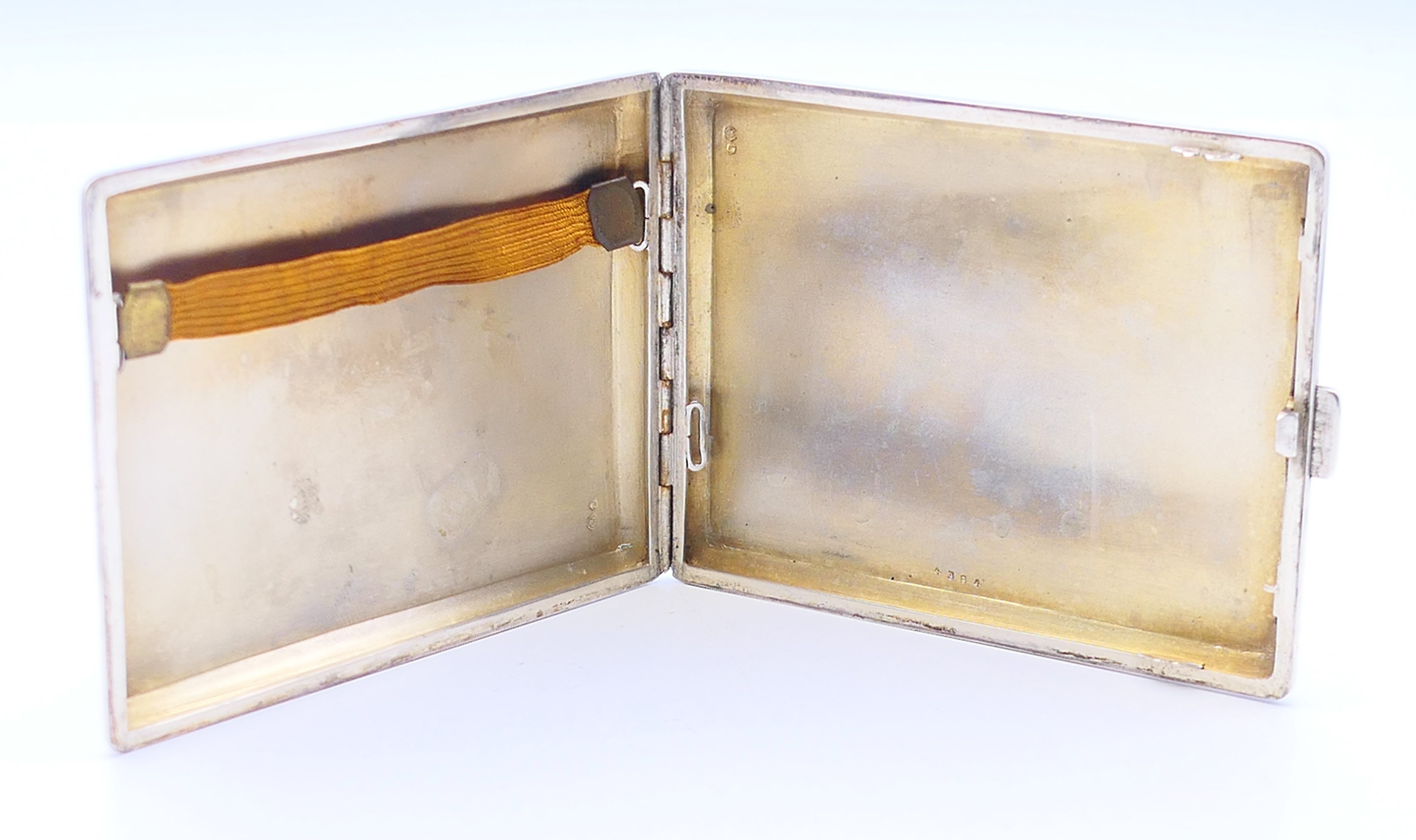 A continental silver and blue enamel cigarette case. 10 cm x 8 cm. - Image 5 of 8