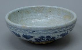 A Chinese blue and white pottery bowl. 25.5 cm diameter.