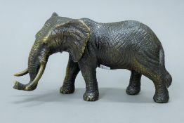 A bronze elephant. 29 cm long.