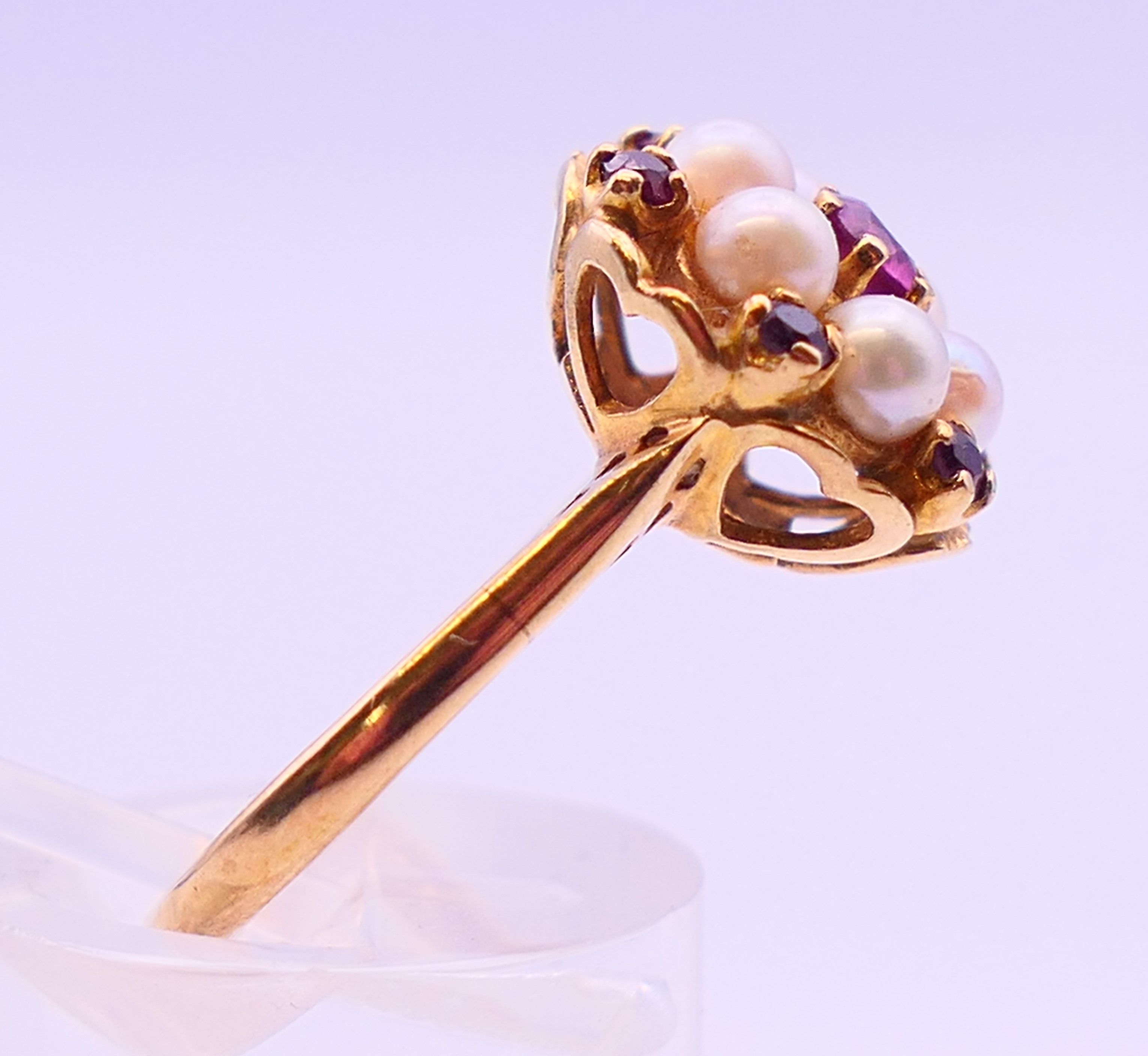 A 9 ct gold, pearl and ruby cluster ring. Ring size M. - Image 4 of 8