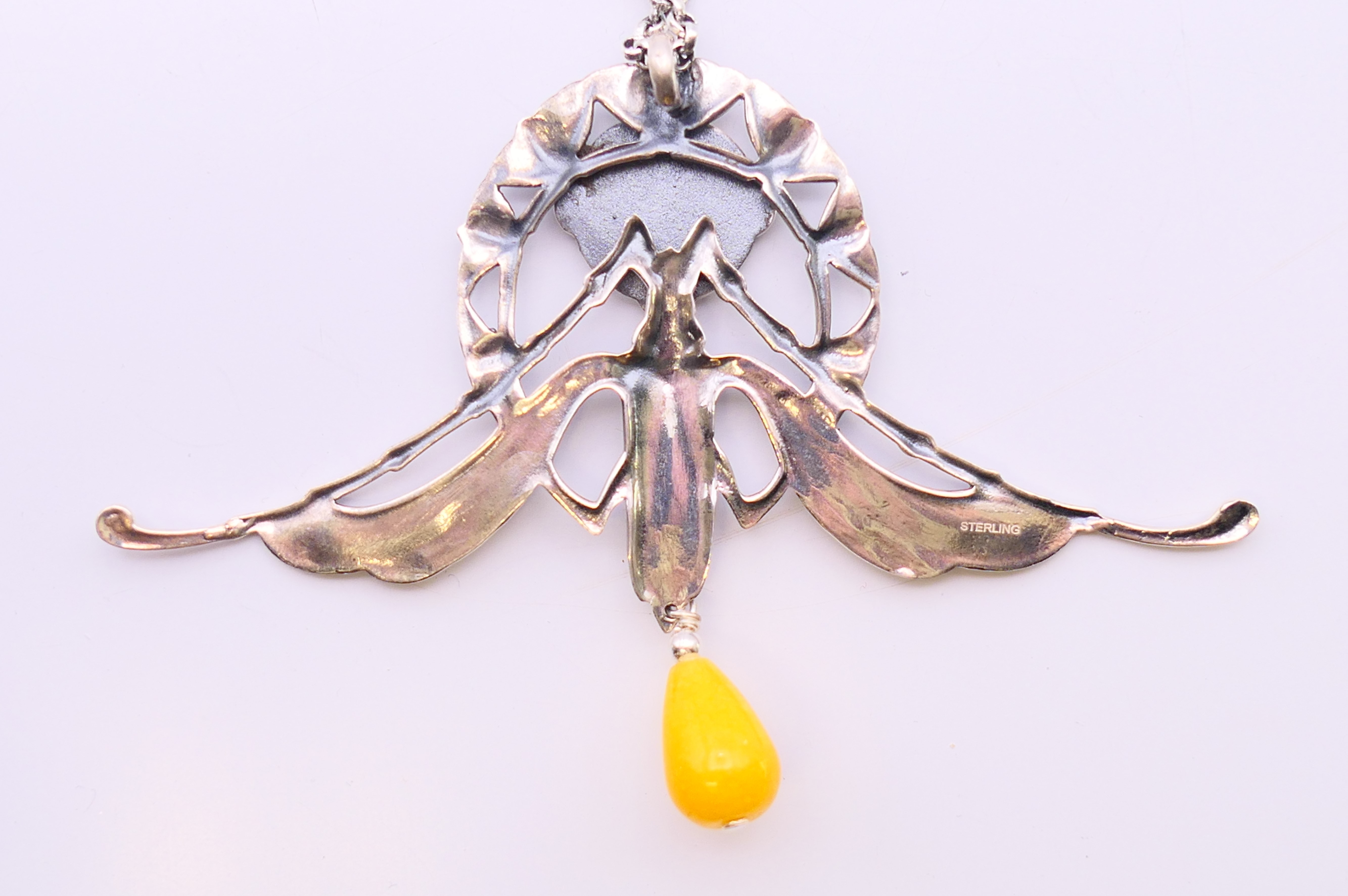 A silver Art Nouveau-style winged female head and bead pendant on a silver chain. - Image 3 of 6