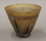 An antique horn cup. 9.5 cm high.