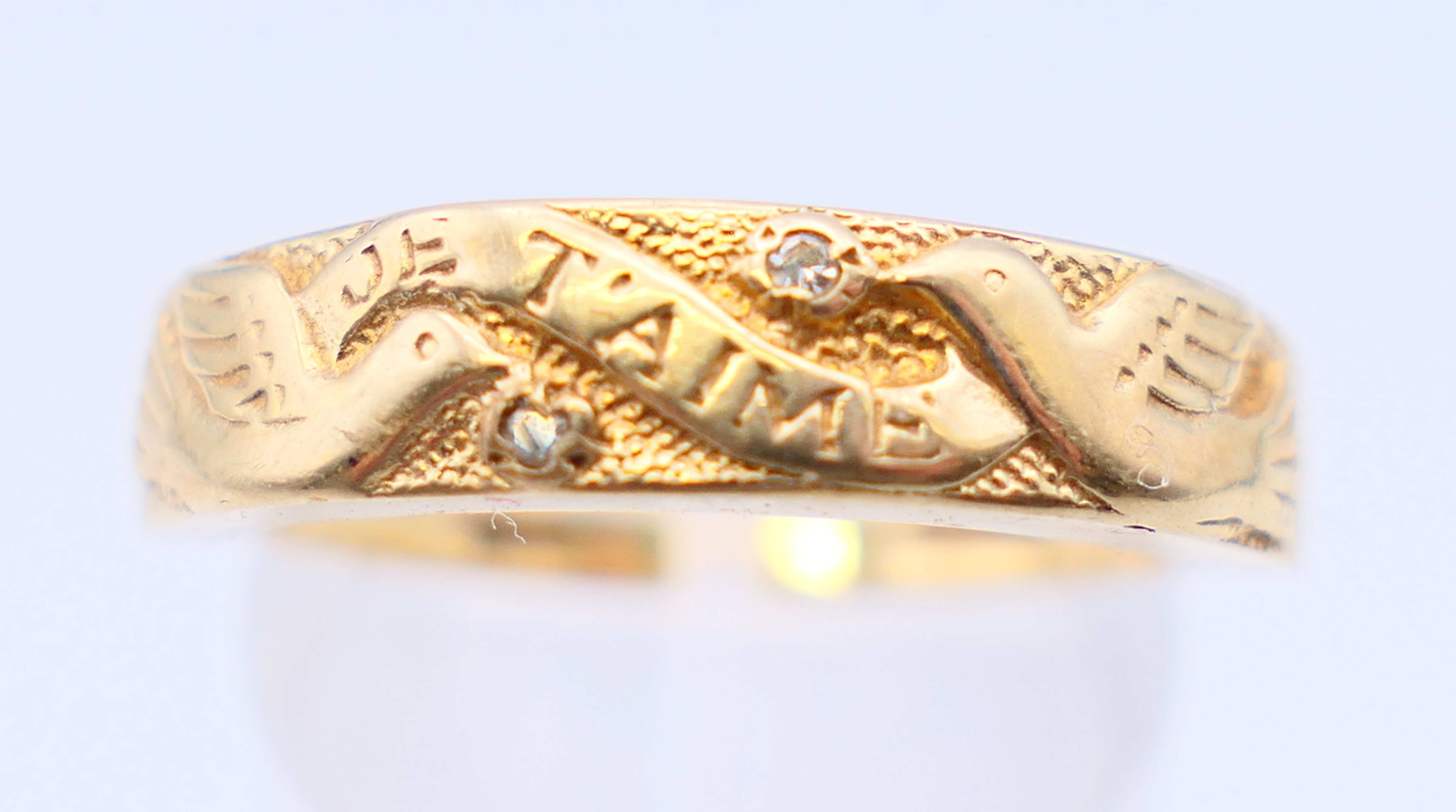 A 9 ct gold and diamond ring with two doves and marked Je T'aime. Ring size Q/R. - Image 4 of 10
