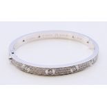 A Cartier 18 K white gold and diamond encrusted love bangle numbered 19 PDR729. 6.