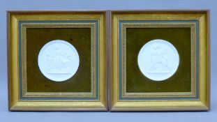 A pair of Copenhagen porcelain plaques, each depicting a classical scene, each framed. 32.