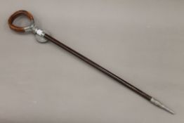 A vintage Howell of London shooting stick. 85 cm long.