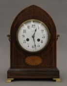 An Edwardian inlaid rosewood-cased mantle clock. 30 cm high.