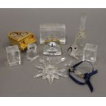 A collection of Swarovski glass ornaments and laser block glass ornaments, all boxed.