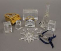 A collection of Swarovski glass ornaments and laser block glass ornaments, all boxed.
