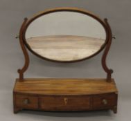 A 19th century mahogany toilet mirror. 57 cm wide.