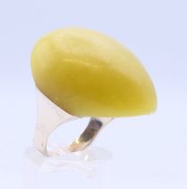 A silver Modernist jade ring. Ring size O.