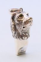 A silver labrador head whistle pendant. 3.5 cm high.