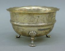 A circular silver sugar bowl, hallmarked Sheffield 1926. 11 cm diameter. 180 grammes.