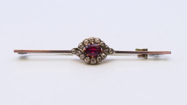 A diamond set bar brooch. 6 cm long. 4.7 grammes.