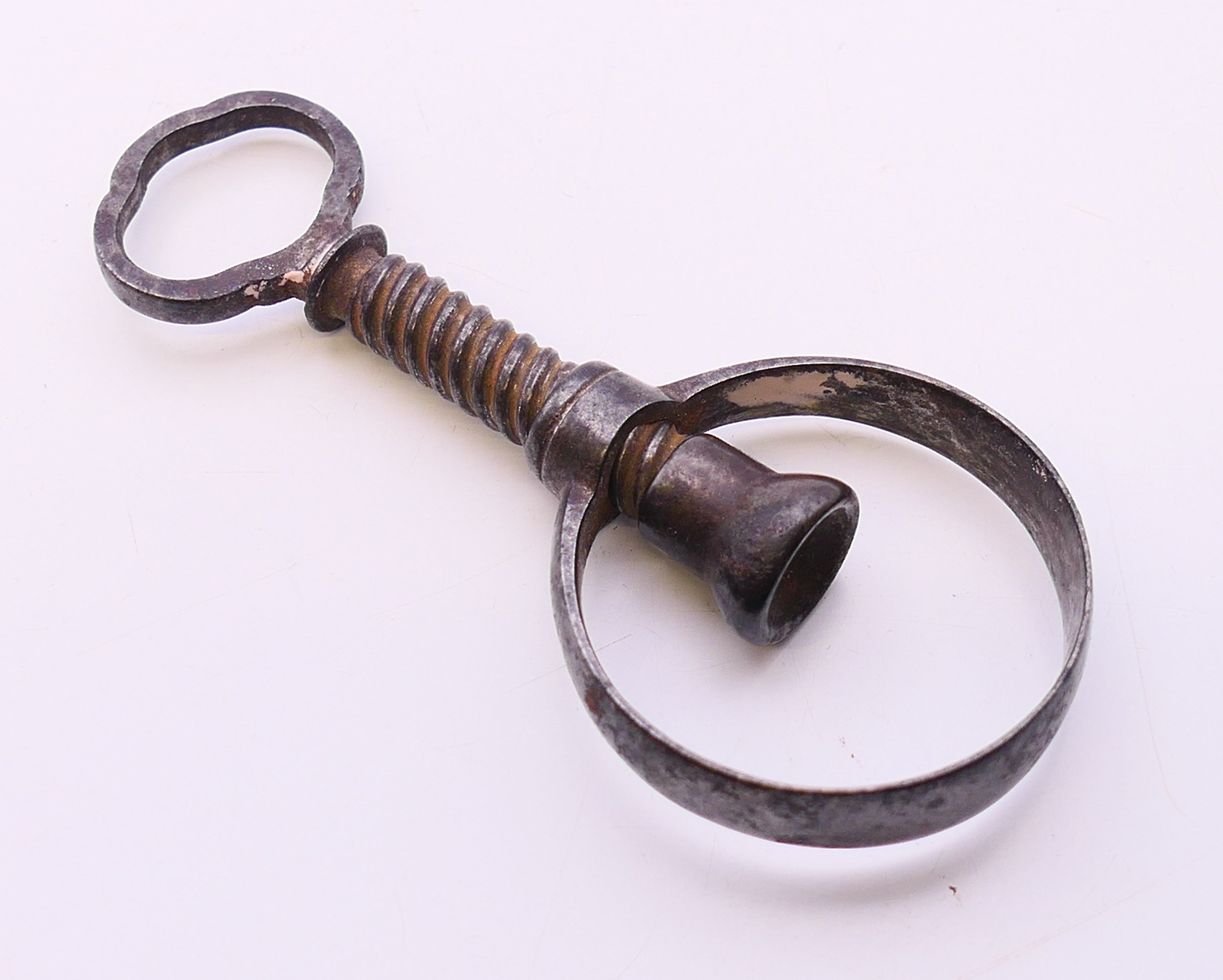 An 18th century steel nut cracker. 9.5 cm high.