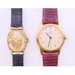 Two boxed Omega ladies' wristwatches. The largest 2.25 cm wide.