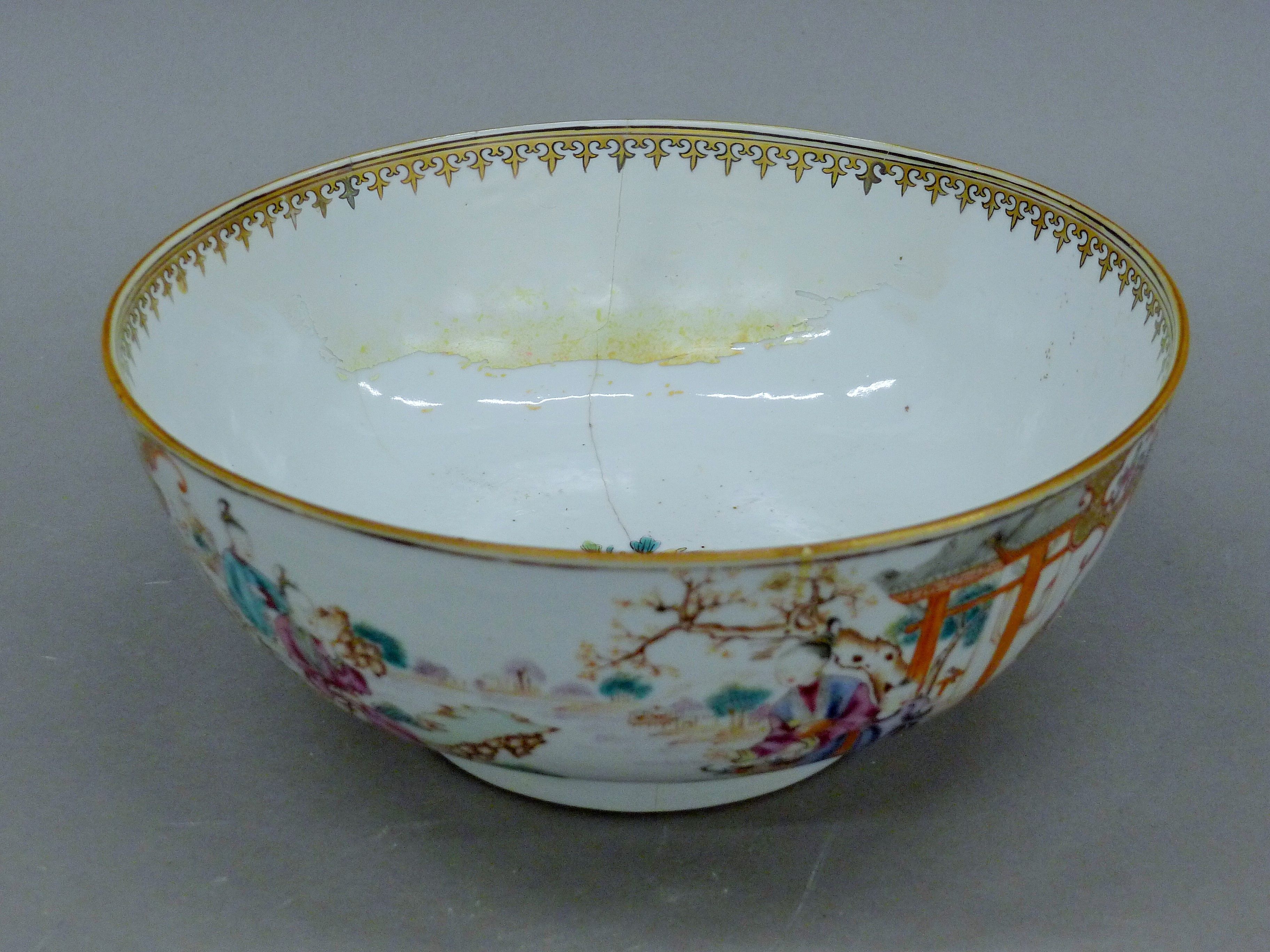 An 18th century Chinese porcelain bowl decorated in a traditional palette. 26 cm diameter.