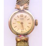 A Tudor by Rolex wristwatch, together with guarantee booklet. 1.8 cm wide.