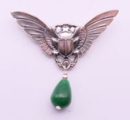 An Art Deco-style silver scarab brooch. 5.5 cm wide.