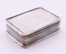 A Georgian silver vinaigrette, marked for Birmingham. 3 cm wide.