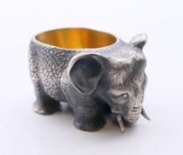 A silver elephant form salt bearing Russian marks. 5 cm long.