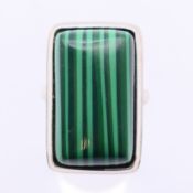A silver and malachite ring. Ring size R/S.