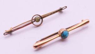 Two 9 ct gold bar brooches, one set with peridot, the other turquoise. The former 5 cm wide. 3.