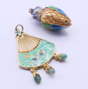 Two Chinese silver enamel pendants. The largest 4 cm high.
