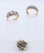 Three 9 ct gold and diamond cluster rings. 11.7 grammes total weight.