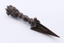 A Tibetan ceremonial bronze dagger. 15.5 cm high.