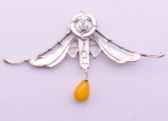 A silver Art Nouveau-style dragonfly brooch. 10.5 cm wide.