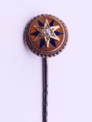 A 19th century diamond set stickpin. 1.2 cm diameter.