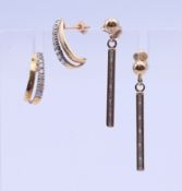 Two pairs of 9 ct gold and diamond earrings. The largest 3 cm high.