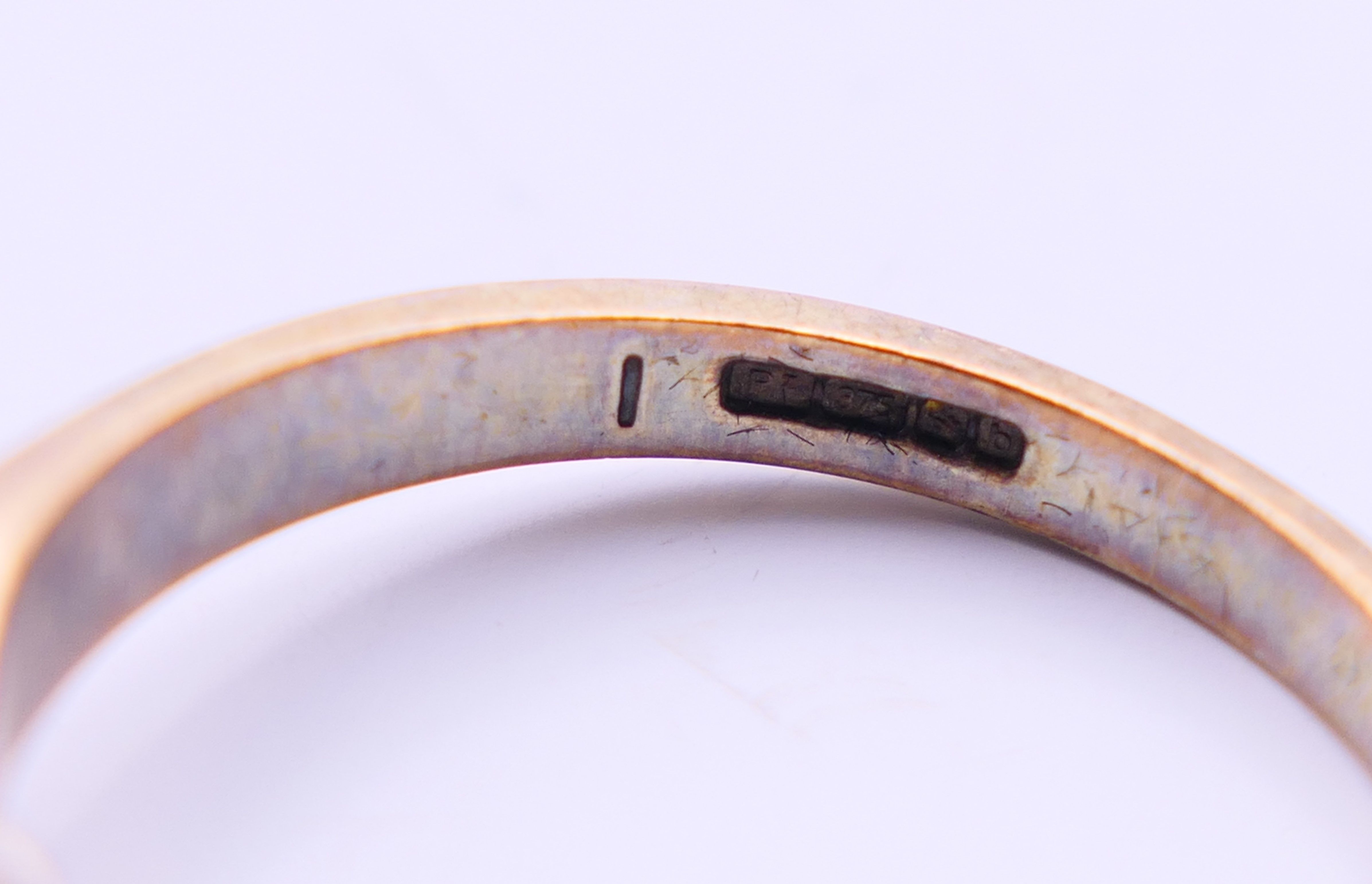 A 9 ct gold and diamond cluster ring. Ring size N/O. - Image 5 of 6