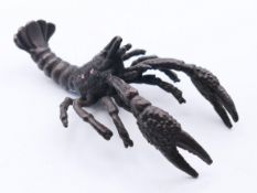 A bronze model of a crayfish. 9 cm long.