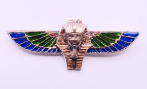 An Egyptian revival silver brooch. 8 cm wide.