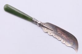 A silver and jade butter knife. 14.5 cm long.