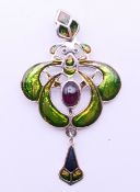 A silver green Art Nouveau-style pendant. 3.5 cm wide.