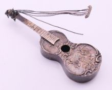 A Dutch silver model a guitar. 12.5 cm long.