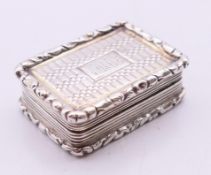 A Georgian silver vinaigrette, marked for Birmingham, maker's mark T S. 3.25 cm wide.